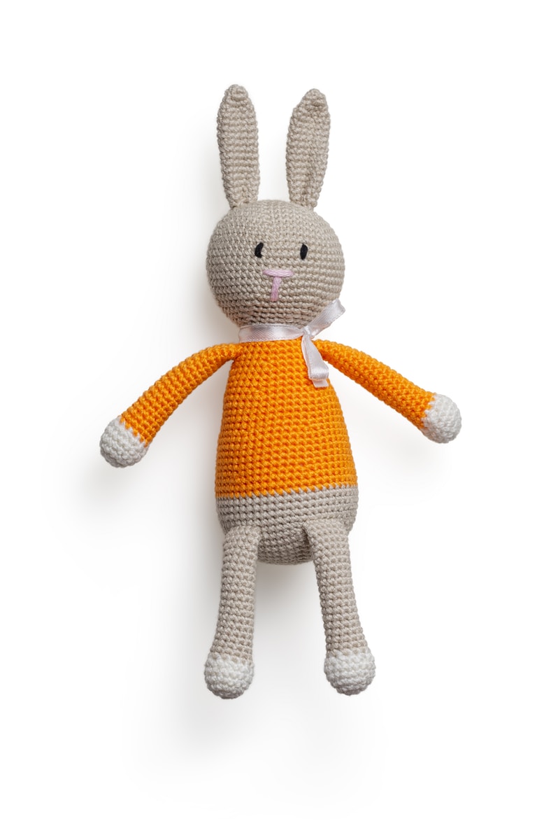 white and yellow rabbit plush toy